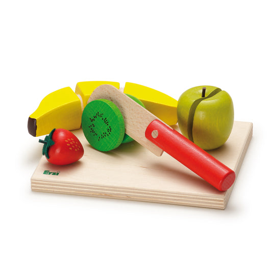 Erzi Schneidset Obstsalat mit Bananen, Erdbeere, Kiwi, Apfel und rotem Messer auf Holzbrett