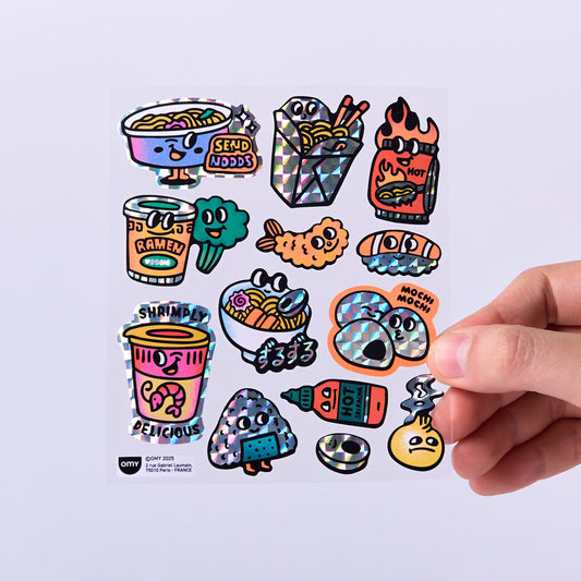 OMY Big Noodle Stickerbogen mit bunten Cartoon-Motiven, Hand hält einen Sticker