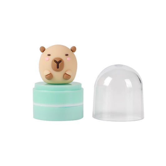 Stempel mit Figur Capybara, Schutzkappe abgenommen daneben