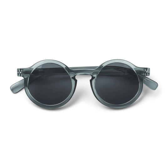 Kindersonnenbrille DARLA von Liewood mit rundem Rahmen aus transparentem Polycarbonat in Blau