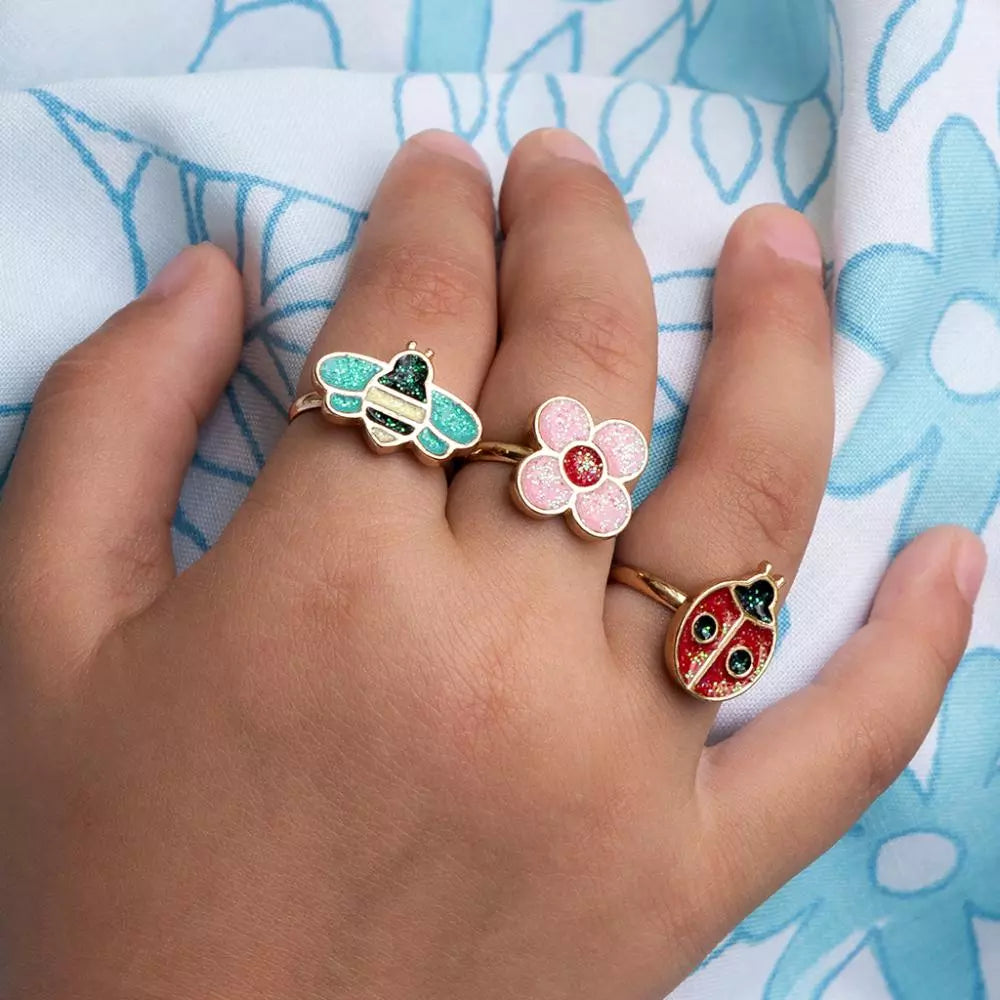 Drei Glitzerringe mit Marienkäfer-Motiv von Rex London in Rot mit schwarzen Punkten