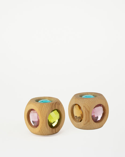 Zwei Bauspiel Zauberwürfel Pastell aus Holz mit farbigen Funkelsteinen in den runden Aussparungen