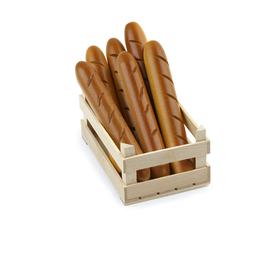 Fünf Erzi Holz-Baguettes in naturbraun mit Schnittrillen in einer kleinen Holzkiste aus hellem Holz