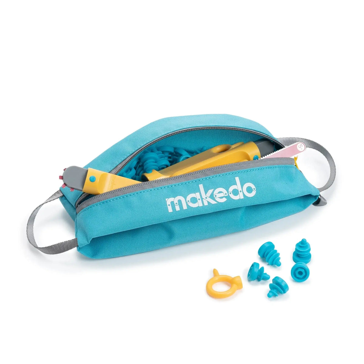Makedo Tool-Case mit gelben Werkzeugen und blauen Teilen teilweise herausgezogen