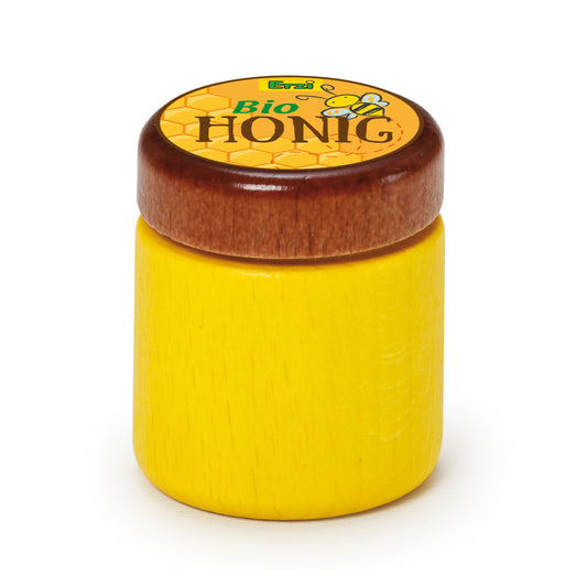 Erzi Holz-Honig, gelbes Glas mit braunem Holzdeckel und Bio-Honig-Etikett, Packshot