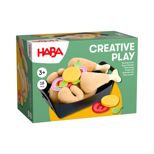 Haba Creative Play Brathähnchen, Verpackung mit Brathähnchen und Beilagen aus Stoff auf einem Backblech