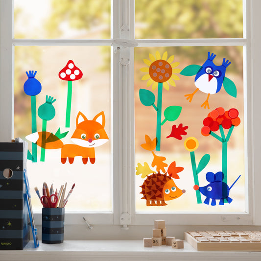 Haba Fensterbild Waldtiere, bunte Papierformen von Fuchs, Igel, Vogel und Blumen auf zwei Fensterglasscheiben