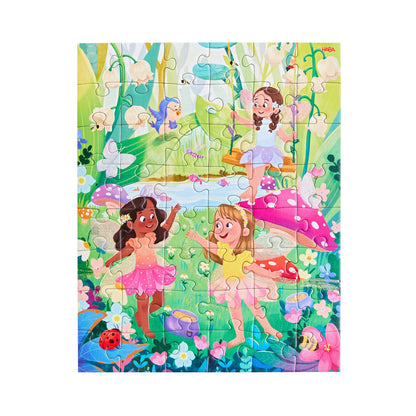 Haba Zauberträume Glitzer Puzzle mit vier Feen in Blütenkleidern zwischen Rankpflanzen und Blüten