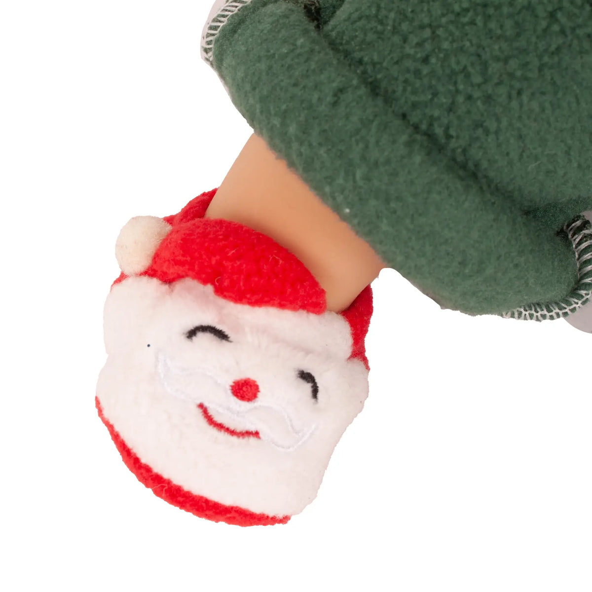 Detailaufnahme eines Weihnachtsmann-Puschens der Götz Muffin Baby Christmas Candy mit roter Mütze und weißem Bart