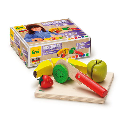 Erzi Schneidset Obstsalat mit Banane, Kiwi, Apfel und Erdbeere aus Holz, Messer, Brett und Verpackung