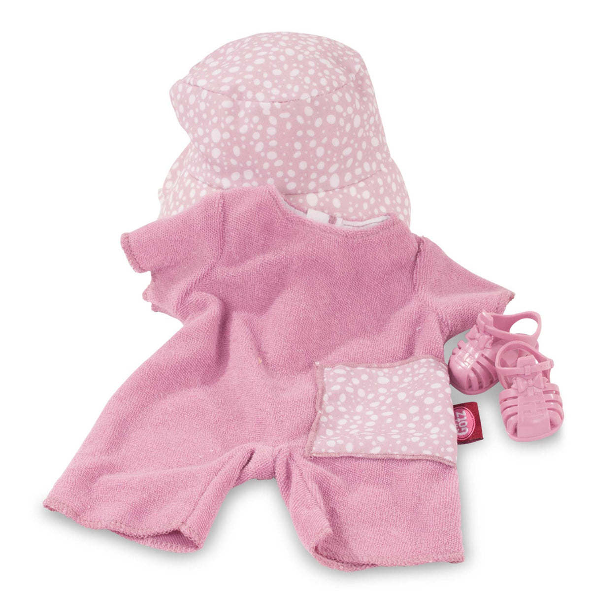 Götz Babykombi Sommer schräg liegend: rosa Frottee-Overall, getupfter Sonnenhut und rosa Sandalen im Detail