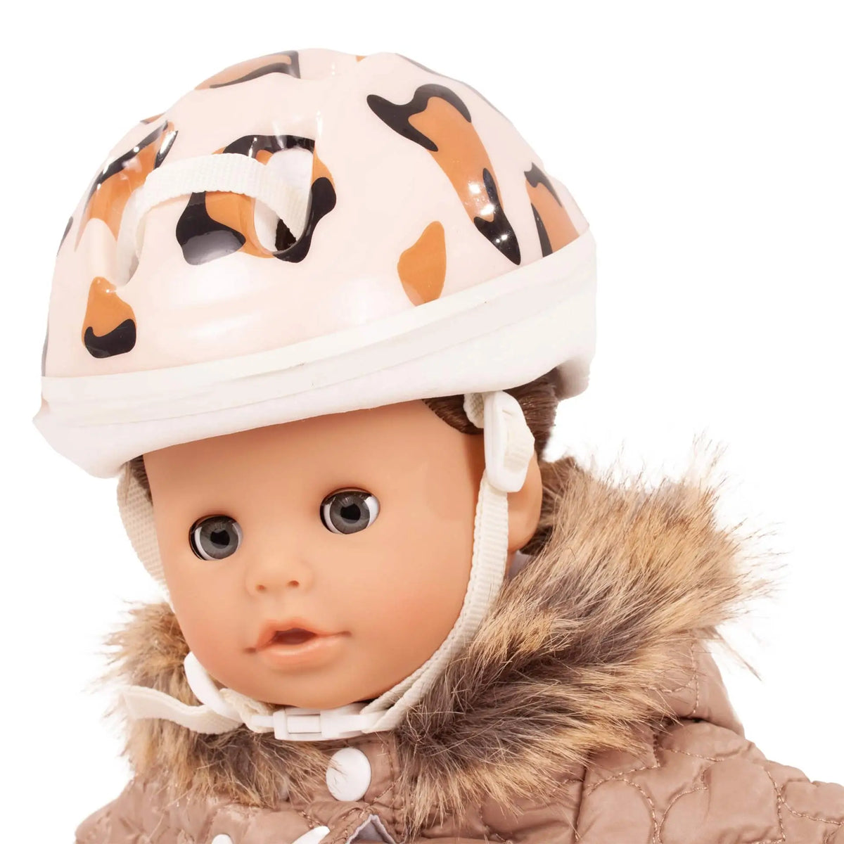 Götz Fahrradhelm Tiger mit cremefarbenem Helm und orange-schwarzem Fleckenmuster auf Puppenkopf mit Gesicht und Hals