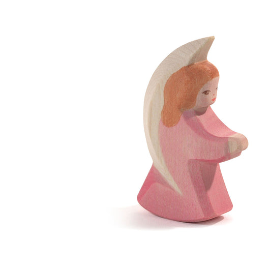 Ostheimer Engelchen aus Holz mit rosa Kleid, rotem Haar und cremefarbenem Flügel, Seitenprofil