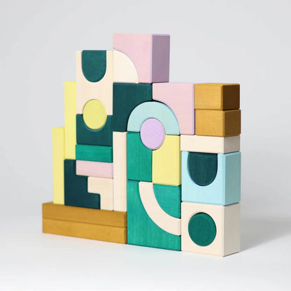 Holz-Baukasten Grimm's Movement mit Rädern, Achsen und geometrischen Bauteilen in Naturholz