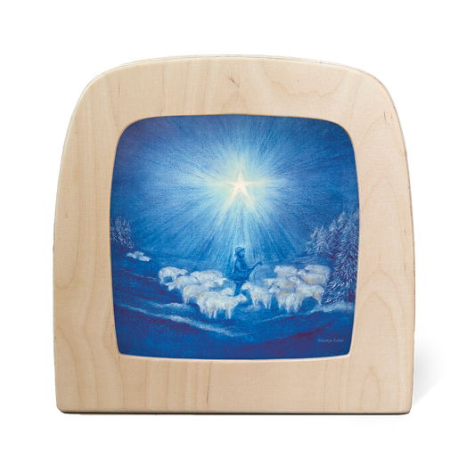 Toverlux Silhouettenlampe aus hellem Holz, Frontalansicht mit Hirte, Schafherde und leuchtendem Stern