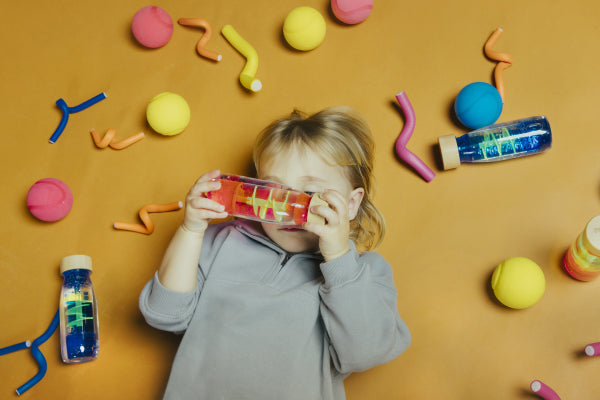 Petit Boum - Sensorikspielzeug Bottle Move Spiral - Pink