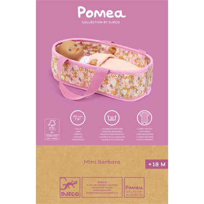 Pomea Mini Barbara Verpackung mit Babypuppe in gemusterter Tragetasche auf rosa Hintergrund