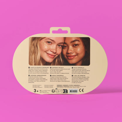 Rückseite der OMY Sommersprossen-Tattoos Verpackung mit Mädchenfoto und mehrsprachiger Anleitung