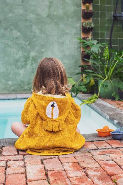 Kinderponcho Trixie Mr. Lion mit aufgesticktem Löwengesicht in Creme und Braun