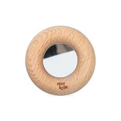 Petit Boum Reflect Donut aus Holz mit rundem Loch in der Mitte, glatte helle Holzoberfläche, Spiegeleinsatz sichtbar