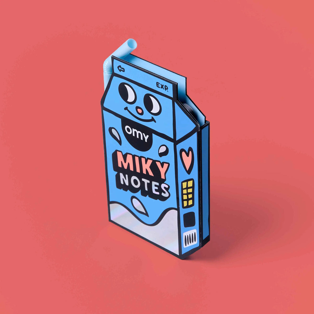 OMY Miky Notes Haftnotizen in blauer Milchkarton-Form als Packshot vor rosa Hintergrund