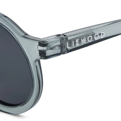 Kindersonnenbrille DARLA von Liewood mit rundem Rahmen aus transparentem Polycarbonat in Blau