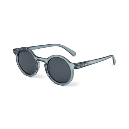 Kindersonnenbrille DARLA von Liewood mit rundem Rahmen aus transparentem Polycarbonat in Blau