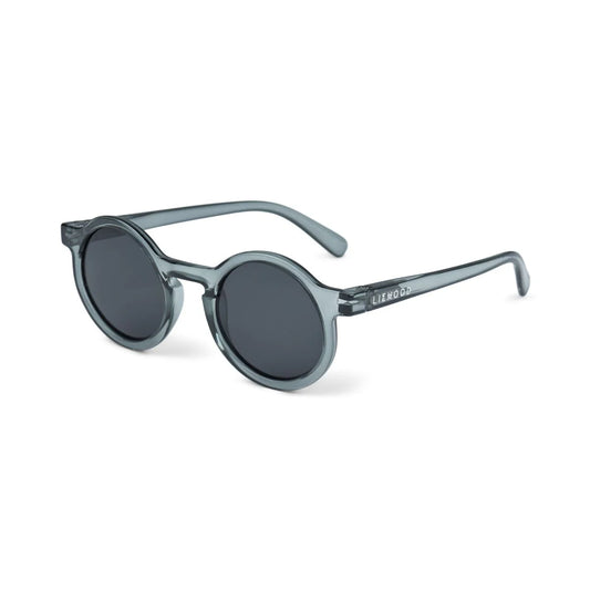 Kindersonnenbrille DARLA von Liewood mit rundem Rahmen aus transparentem Polycarbonat in Blau