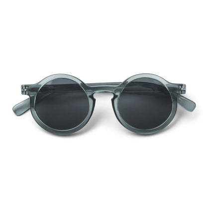 Kindersonnenbrille DARLA von Liewood mit rundem Rahmen aus transparentem Polycarbonat in Blau