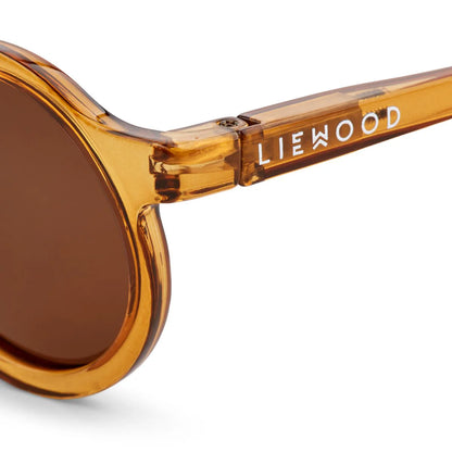 Liewood DARLA Sonnenbrille für Kleinkinder mit rundem Rahmen in transparentem Mustard