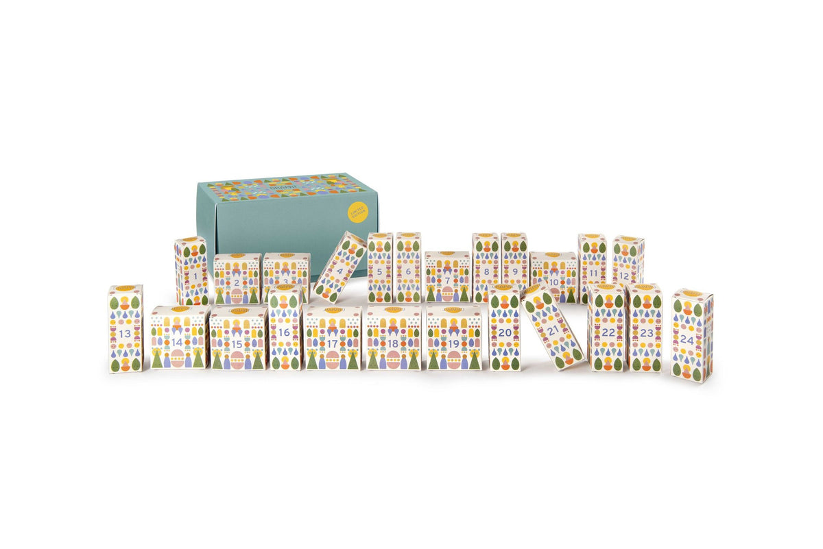 Grapat Adventskalender 2026, die bedruckten Kalenderschachteln in einer Reihe vor der großen Schachtel