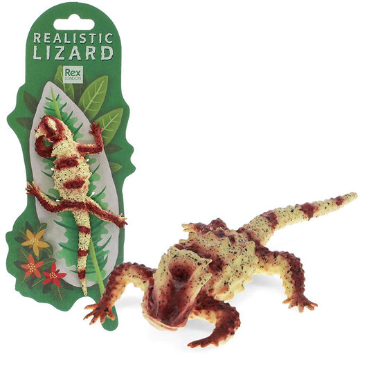 Rex London Realistische Krötenechse, creme-rote Tierfigur mit körniger Textur neben grüner Verpackung
