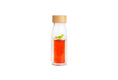 Petit Boum - Sensorikspielzeug Move Bottle - T-Rex