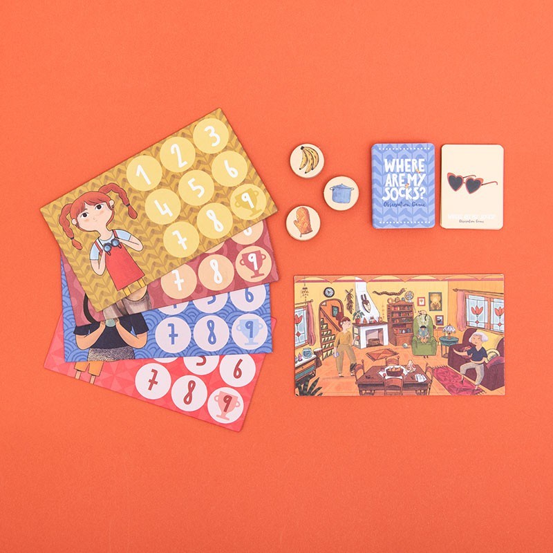 Londji Where Are My Socks, Spielmaterialien: Spielfeld, nummerierte Chips, Karten und Marker auf orangem Hintergrund