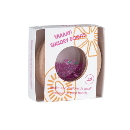 Verpackung des Petit Boum Sensory Donut Trauben, im Sichtfenster lila Trauben-Figuren