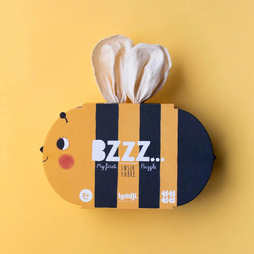 Londji Bzzz: Schachtel in Bienenform mit schwarzen Streifen und Stoffschlaufen als Flügel