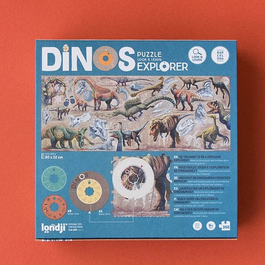 Rückseite des Londji Dino Explorer Puzzles mit Dinosaurier-Szene und farbigen Erkunder-Rädern