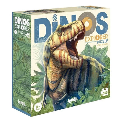 Verpackung des Londji Dino Explorer Puzzles mit braunem T-Rex und grünen Farnen auf beiger Schachtelvorderseite