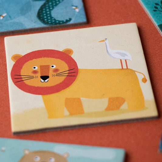 Spielkarte Londji Wild Animals Memory mit gelbem Löwe, roter Mähne und weißem Vogel