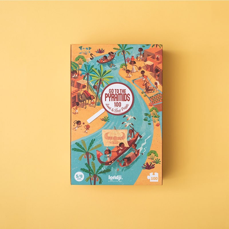 Londji Go to the Pyramids Puzzle 100, Verpackung mit ägyptischen Motiven auf gelbem Untergrund