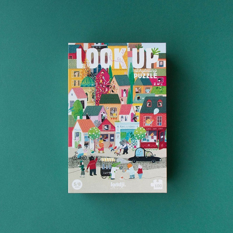 Verpackung des Londji Look Up Puzzles mit bunter Illustration einer Wohnstraße, Häusern und Menschen in Pastellfarben
