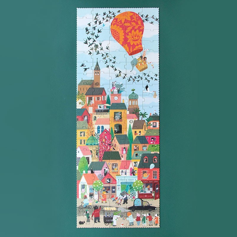 Londji Look Up Puzzle, vertikales Motiv mit bunten Häusern, Heißluftballon und fliegenden Vögeln