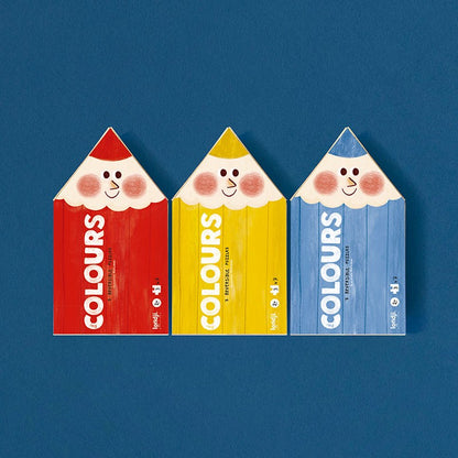 Londji My Colours: drei Schachteln in Buntstiftform in Rot, Gelb und Blau mit lachenden Gesichtern