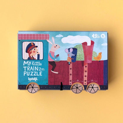 Londji My Little Train Puzzle, Verpackung mit Zugmotiv und Mädchen im Zugführer-Outfit