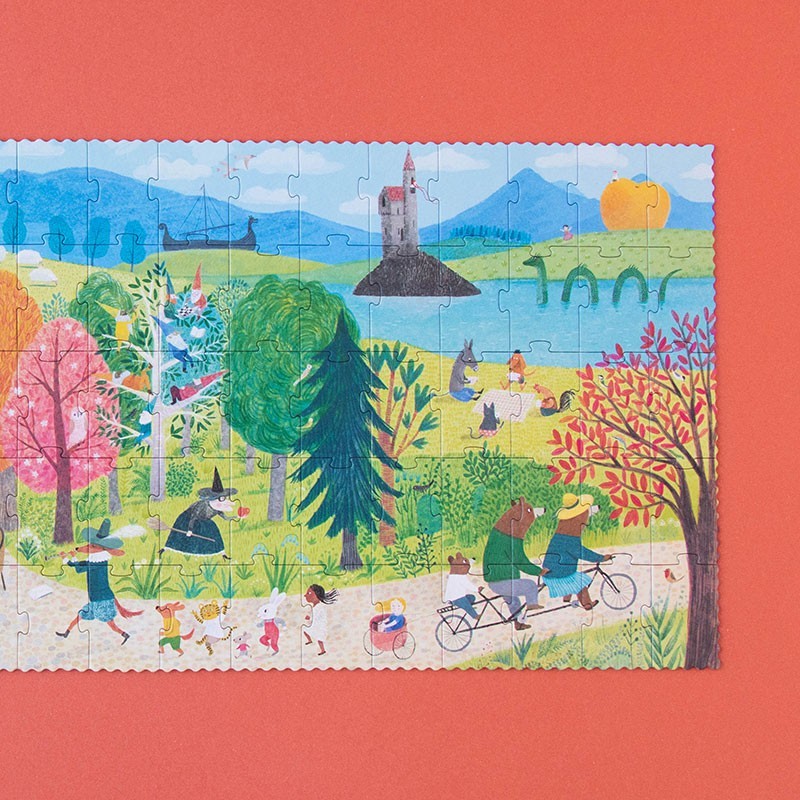 Londji Once Upon a Time Puzzle mit Märchenszenerie, Wald, See, Schloss und spielenden Menschen auf rotem Grund