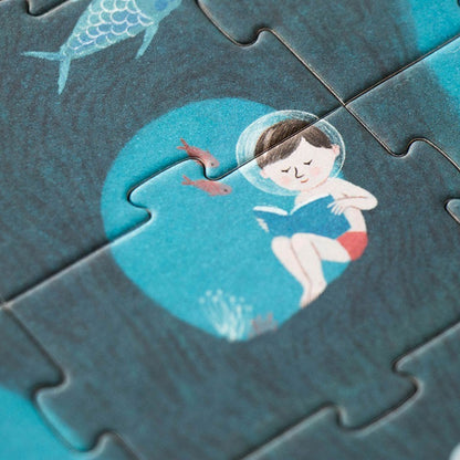 Londji Tea by the Sea Puzzle, Detail mit Kind mit Taucherhelm unter Wasser neben einem Fisch