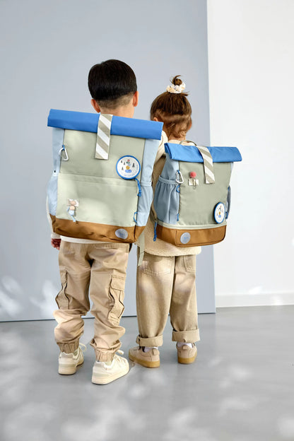Lässig Kindergartenrucksack Rolltop Sunny Explorer in Grün und Blau mit Explorer-Motiv