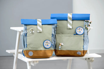 Lässig Kindergartenrucksack Rolltop Sunny Explorer in Grün und Blau mit Explorer-Motiv